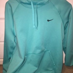 teal nike hoodie.
